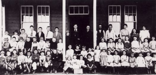 Duntroon School group photograph. David Jones headmaster with pupils on the verandah of the school