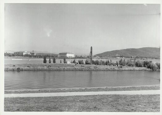 Aspen Island on Lake Burley Griffin with the National Library in the background, Commonwealth Avenue Bridge to the right and Canberra Hospital in the distance.