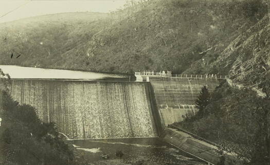 Cotter Dam - water overflowing the spillway