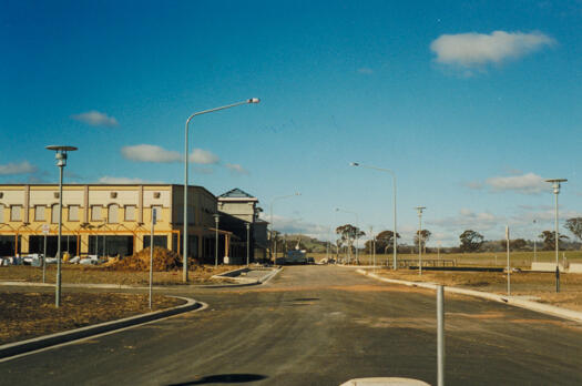 View east along Hibberson Street from Gribble Street showing Gungahlin Marketplace on left.