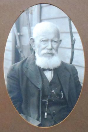 Photograph in oval mount of John Gale (framed) c. 1910. John Gale (1831-1929) came to Australia as a Wesleyan missionary in 1854. He returned to his trade of printing and established Queanbeyan's first newspaper the 'Golden Age', later the 'Queanbeyan Age'.