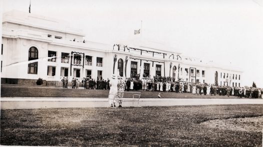 A crowd gathered in front of Parliament House for a memorial service for King George V.