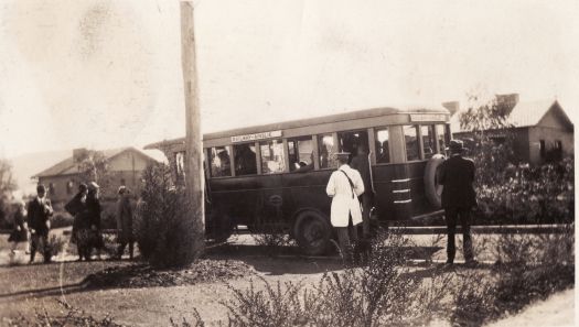 Bus leaving Gorman House