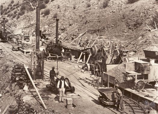 Cotter Dam construction showing workmen and a rail line