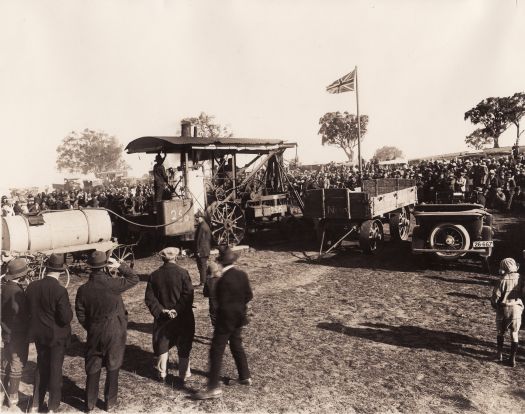 Joe Lea driving a steam shovel at the turning of the first sod, provisional Parliament House.
