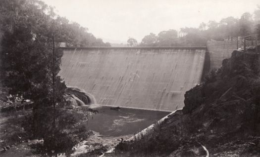 Cotter Dam showing water flowing over the wall