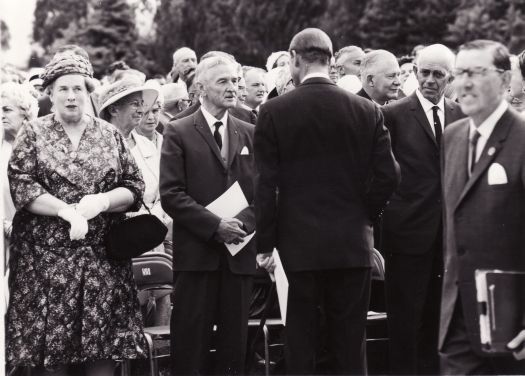 Royal visit, Prince Phillip speaking to CS Daley. Betty Campbell of Woden is on the left of the photo.