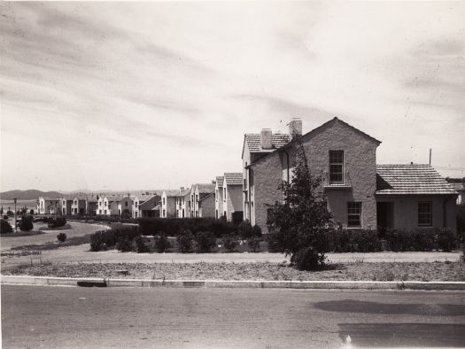 Two story houses in Bougainville Street, Manuka, looking from Furneaux Street