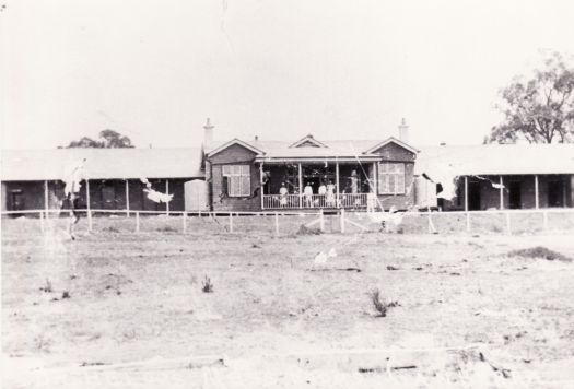 Bachelors Quarters - Lennox House, residents on verandah