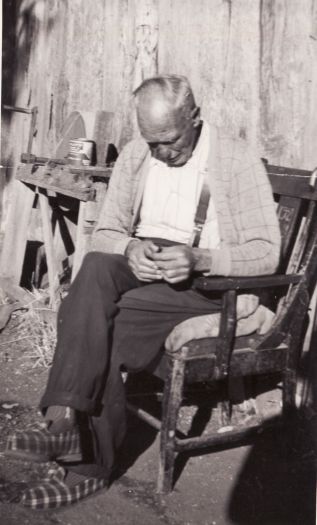 Portrait of Herbert Blundell, aged 74 years, sitting in a chair