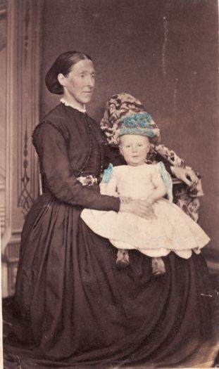Mrs J. Wark senior, 'Carwoola', with small child