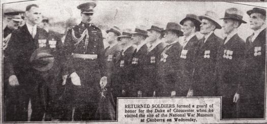 Returned soldiers forming a guard of honour for the Duke of Gloucester at the site of the Australian War Memorial