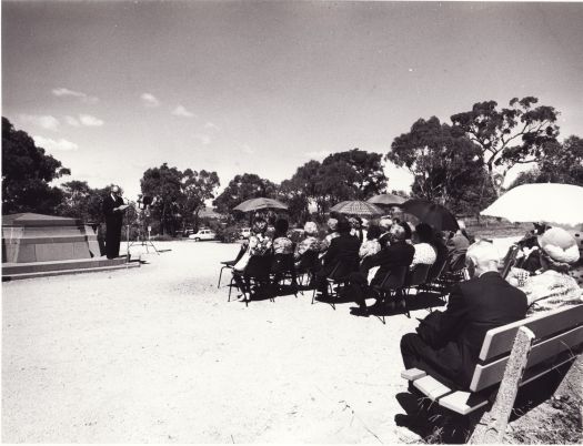 Ceremony at Foundation Stone put on by the CDHS c1960s. The president of the Society is addressing a seated audience.