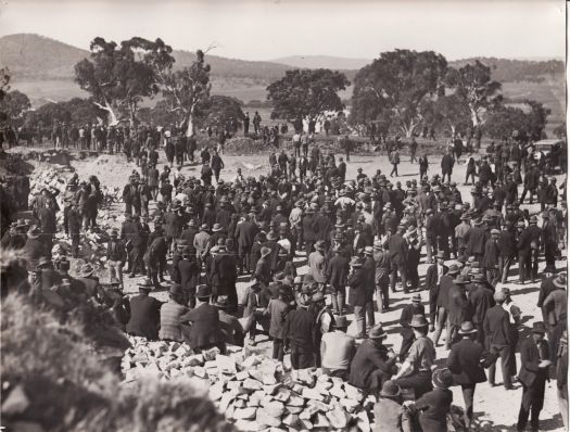 Capital Hill - workmen waiting to be picked up.