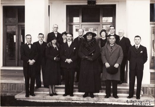 Queen Salole of Tonga with twelve others including RG Casey.