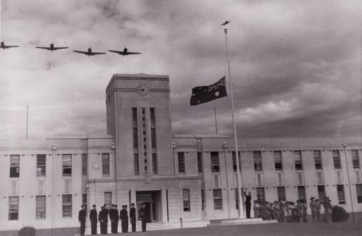 Flag raising at Canberra High School with fly past
Australia Department of Information