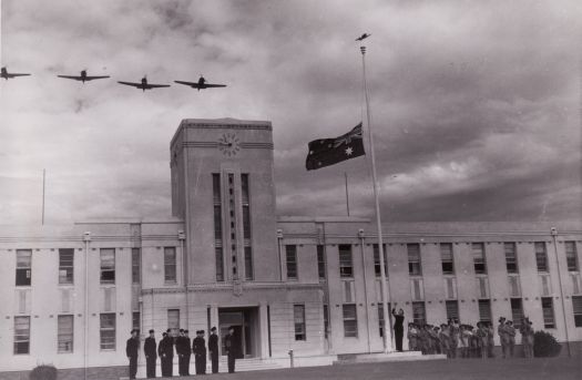 Flag raising at Canberra High School with fly past