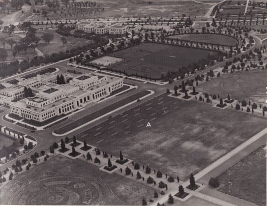 Aerial view to SW over Parliament House and West Block.  Site for King George V statue marked (x2)