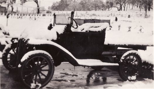 Ford truck under snow