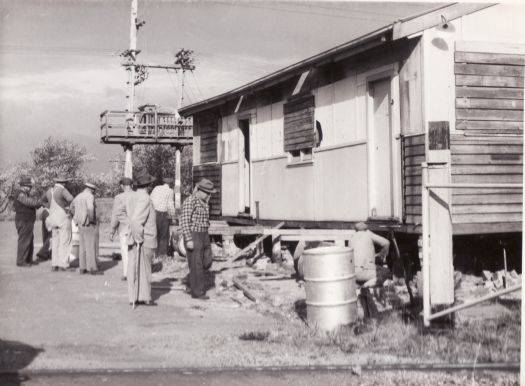 Russian Orthodox Church  - 9 men near prefab including Joe Alexander leaning on cane