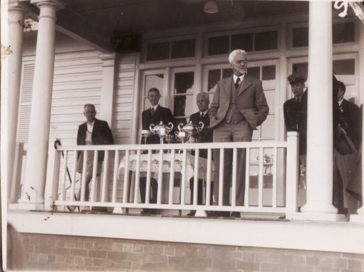 Canberra hockey pavillion. Senator Collings speaking before presentation of trophies.