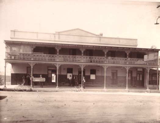 Patrons in front of Walsh's Hotel, Monaro Street, Queanbeyan