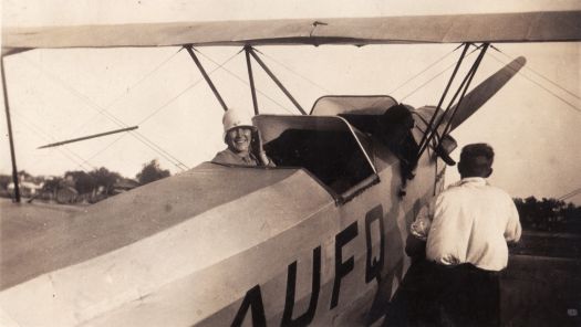 Aeroplane and two people at Narrabeen, Christmas