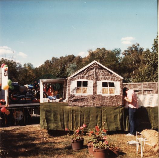 Canberra Day Festival - Andrew Leonard making adjustments to the CDHS Blundells Cottage float prior to the Canberra Day parade.