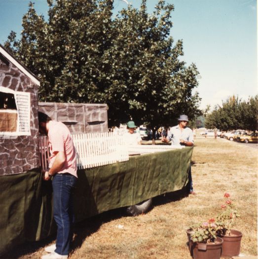 Canberra Day Festival - Andrew Leonard, Stuart Southwell, Kingsley Southwell with the CDHS float, a representation of Blundell's Cottage, before the parade on Constitution Avenue near the pool.