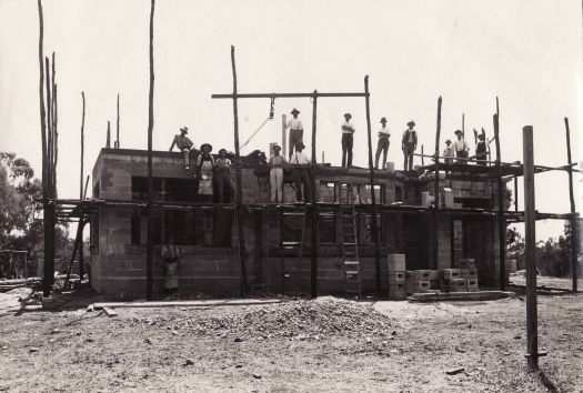 Old court house, partly built with men on scaffolding