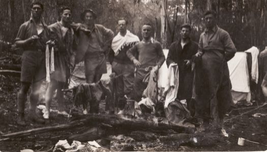 Group of seven Canberra Rover Scouts at camp in the bush