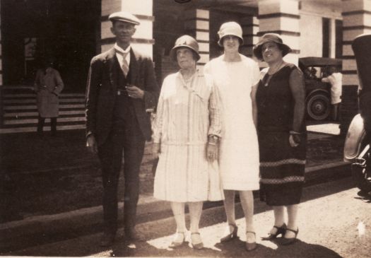 Three women and a man outside Hotel Canberra