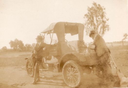Vintage car with two men