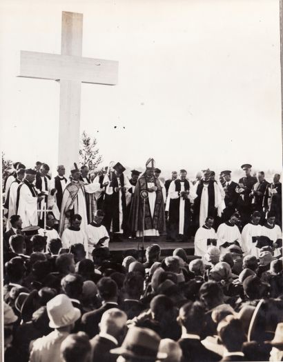 Bishop and clergy officiating at Anglican ceremony.