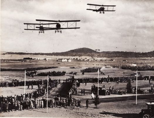 General view of the royal review with aircraft in flight - opening of Parliament House