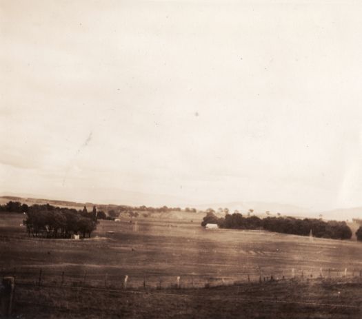 Acton. View from site of Australian National University. Shows a house in middle distance.