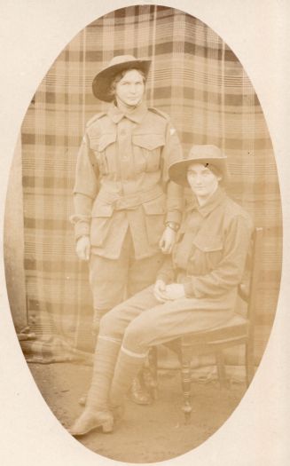 Two women dressed in army uniform