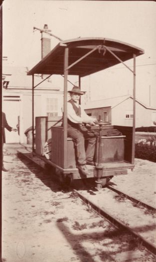 Man sitting in railway trolley