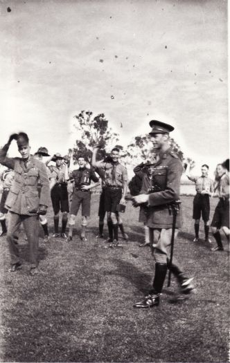 Duke of York at Government House meeting a group of boy scouts. He was in Canberra to open Parliament House.