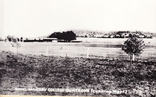 Royal Military College, Duntroon, looking west. Sheds in the foreground; quarters and other buildings in the background.