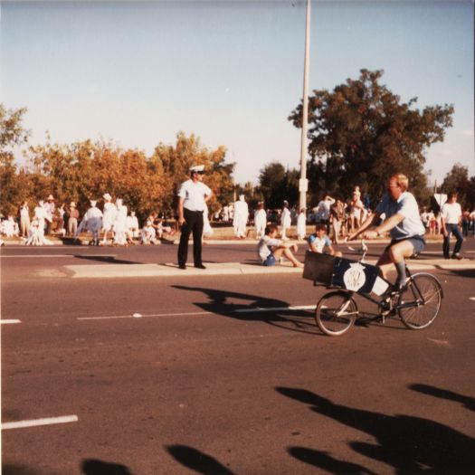 Canberra Day Parade, London Cct (near YWCA) - man on bicycle