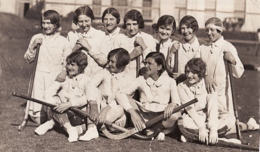 Eleven players from a women's hockey team.