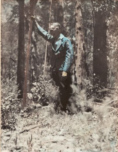 Megalong Valley in the Blue Mountains of NSW. Photo shows an unidentified man leaning against a tree.