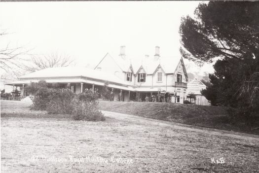 Royal Military College, Duntroon showing a men in front of Duntroon House.