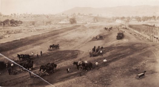 Construction workers with horse & drays, possibly Parliament House