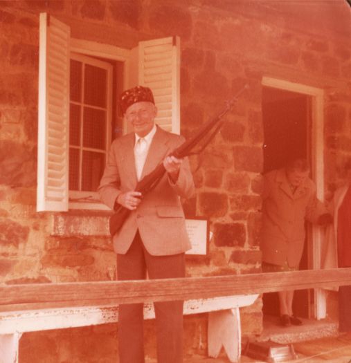 Visitor posing at Blundell's Cottage