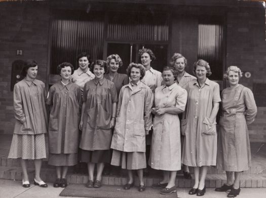 Eleven toy ladies standing at Canberra Community Hospital