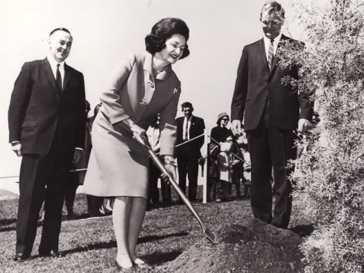 Lady Bird Johnson planting a tree