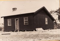 Front view of portable cottages at Acton