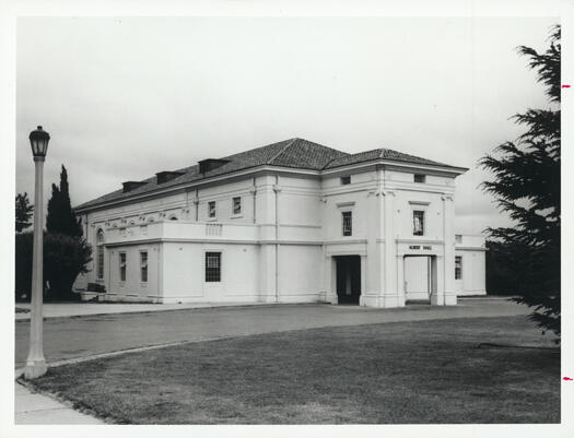 Albert Hall, Commonwealth Avenue in Yarralumla. Shows the front, eastern side of the hall and a lamp post and circular drive